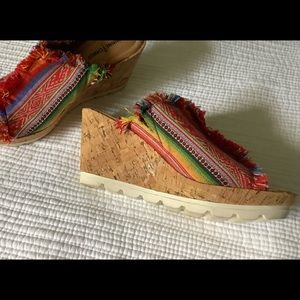 Minnetonka wedges; 9.5; never worn